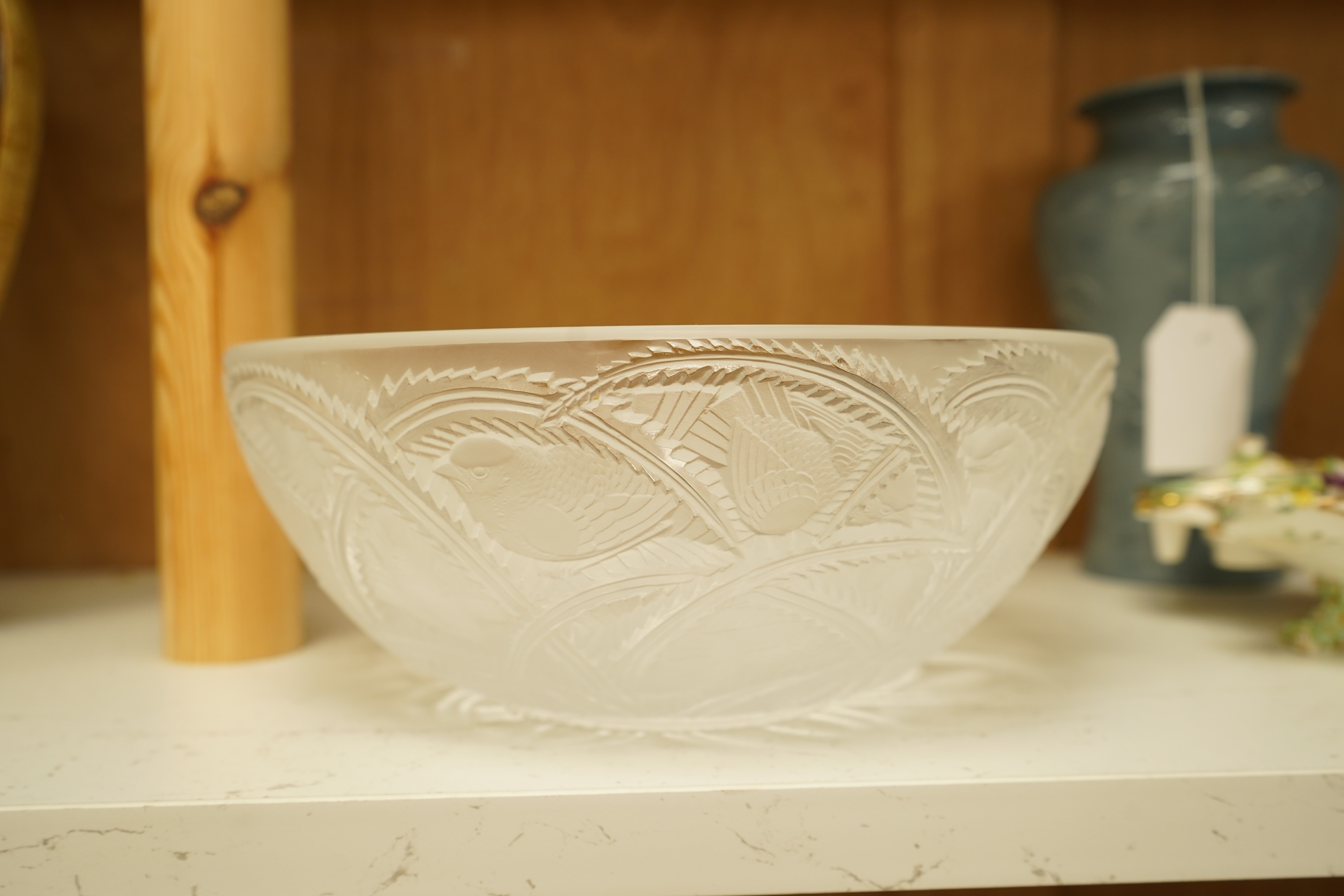 A Lalique glass 'Pinsons' bowl, signed to the base, 23cm high